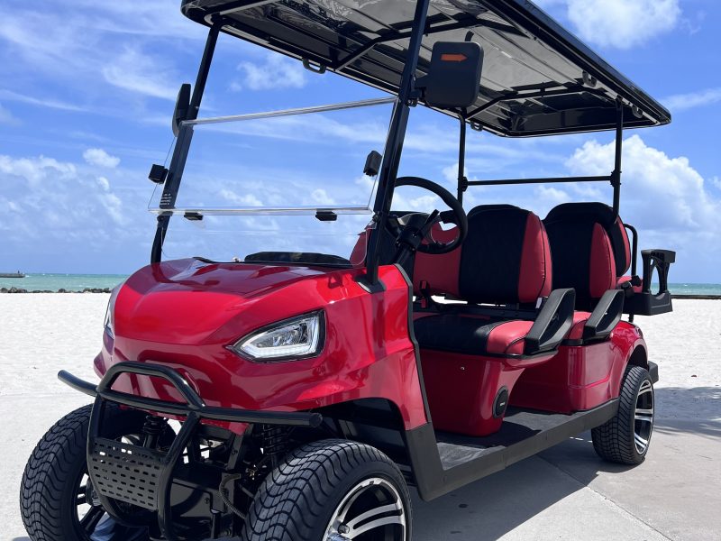a golf cart parked on the side of a road